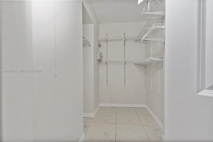 Closet for the Suite with bathroom and private balcony