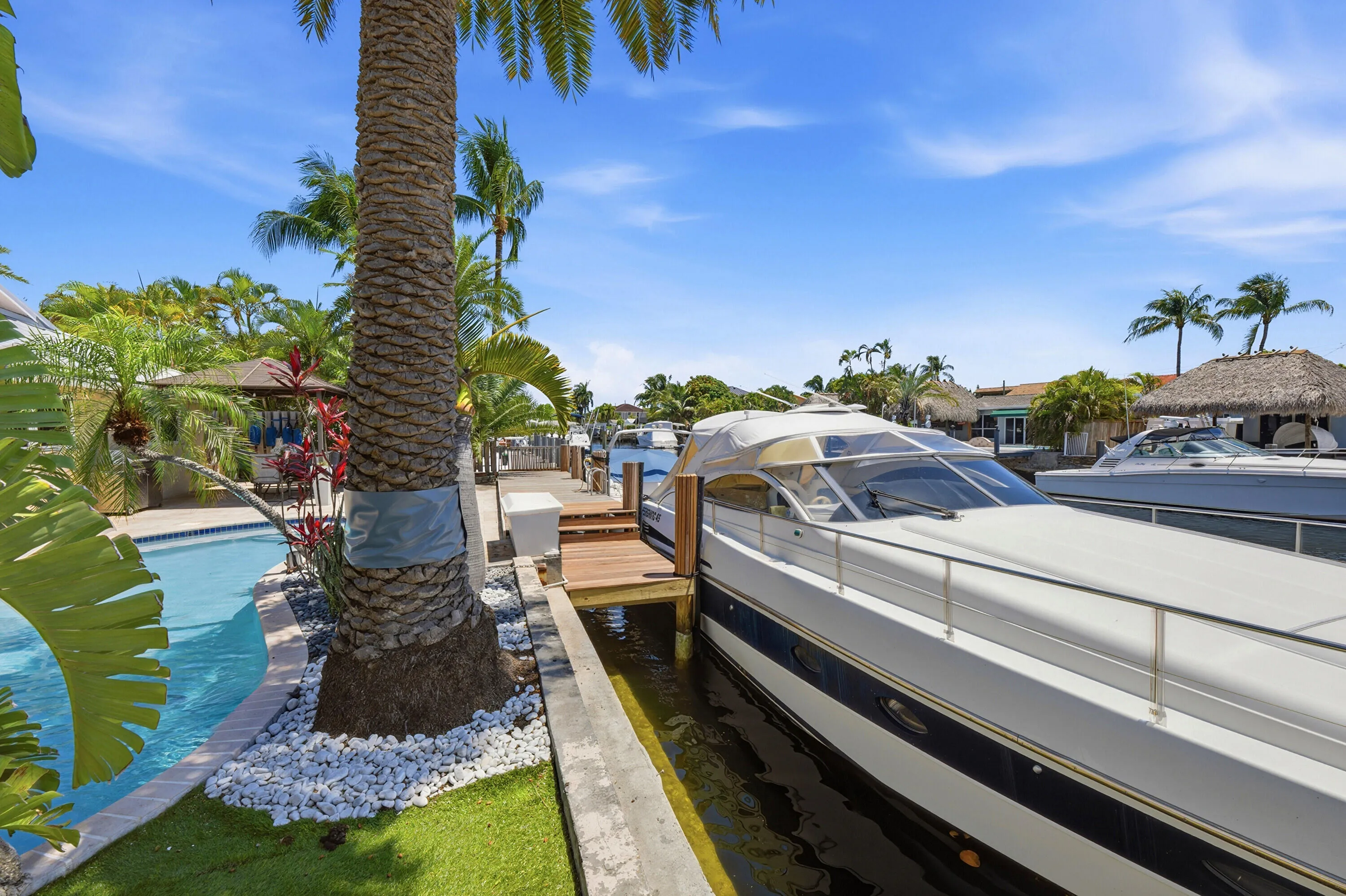 40' Dock, 70' Seawall, Freeform Pool with Rock Waterfall, Covered Patio Space for Fail Safe Outdoor Enteraining. Your Ocean Access, Waterfront Lifestyle at it's Finest!
