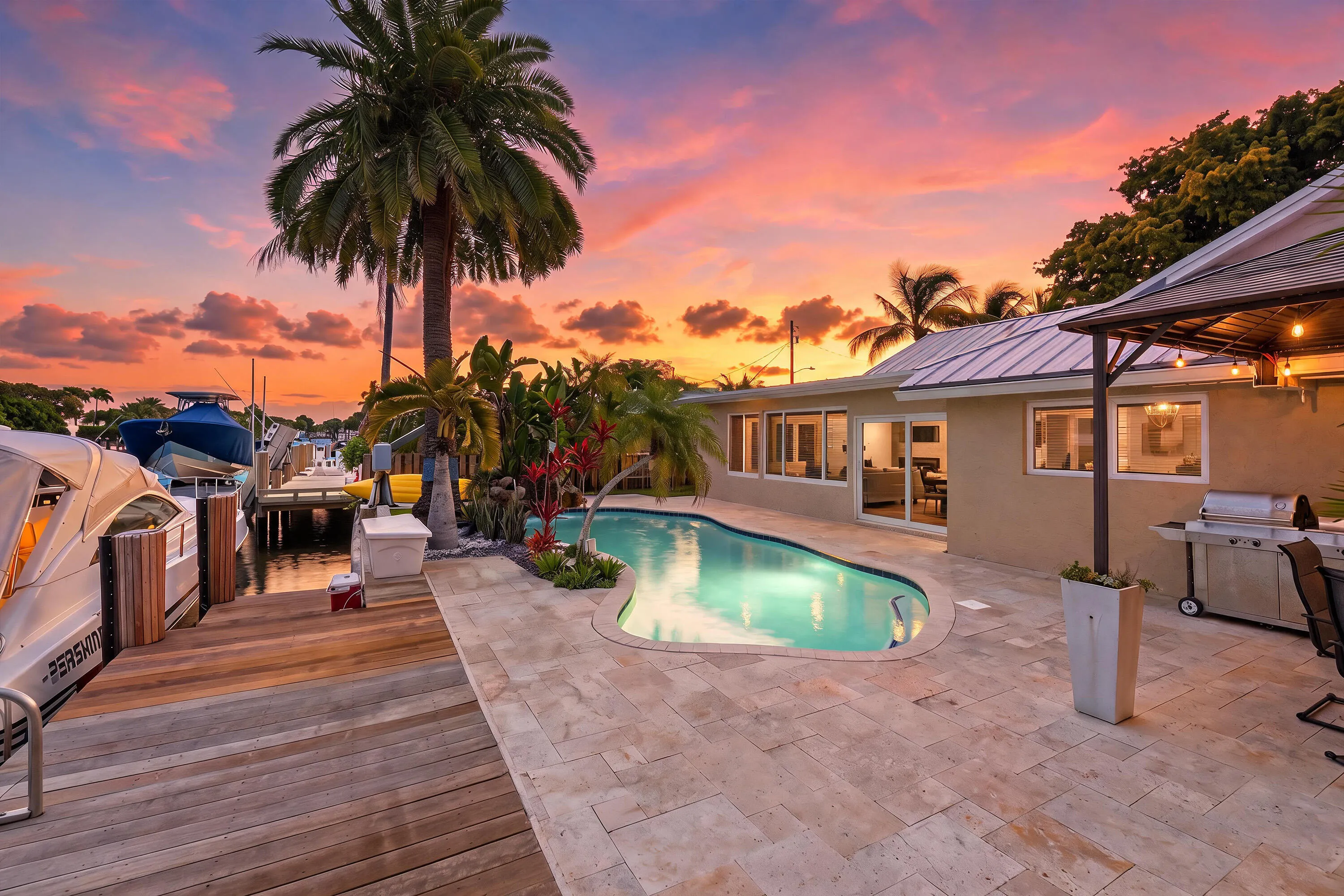 WOW! Your Ocean Access, Waterfront Lifestyle at it's Finest! 40' Dock, 70' Seawall, Freeform Pool with Rock Waterfall, Covered Patio Space for Fail Safe Outdoor Enteraining.