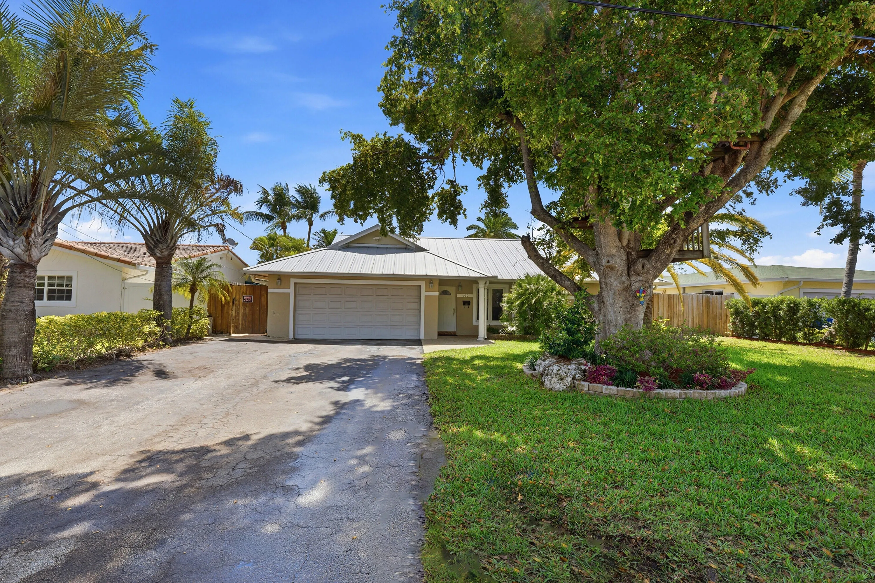 Beautiful, Mature, Lush Landscape surrounds the property. Lots of Parking with a Wide Gate on the South Side of the Home.