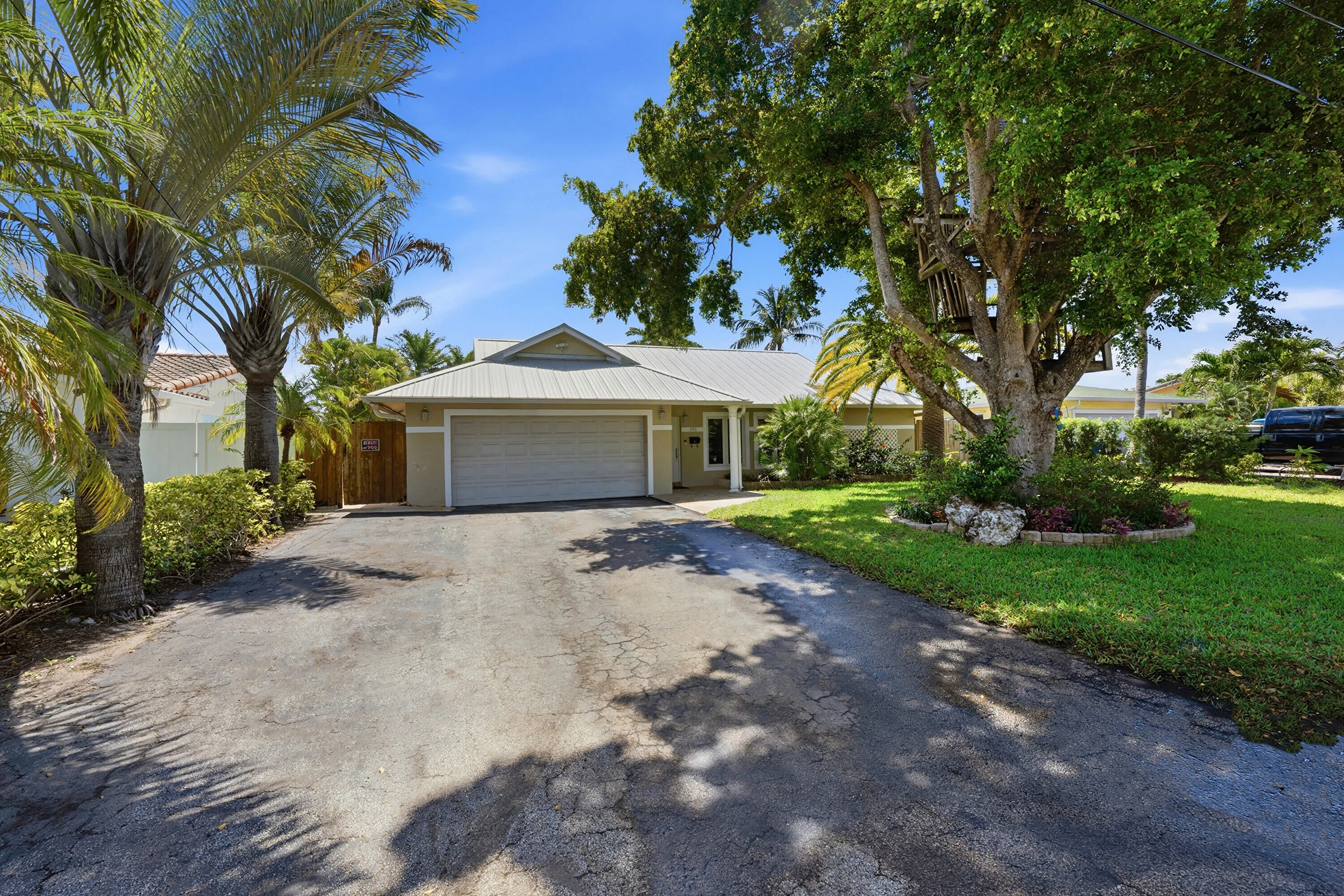 Welcome Home! Aluminum Roof 2024, Impact Windows & Doors, HVAC 2020, 18" Travertine Flooring Inside 2025, Guest Bath 2025, Water Heater 2021, LED Lighting & More!