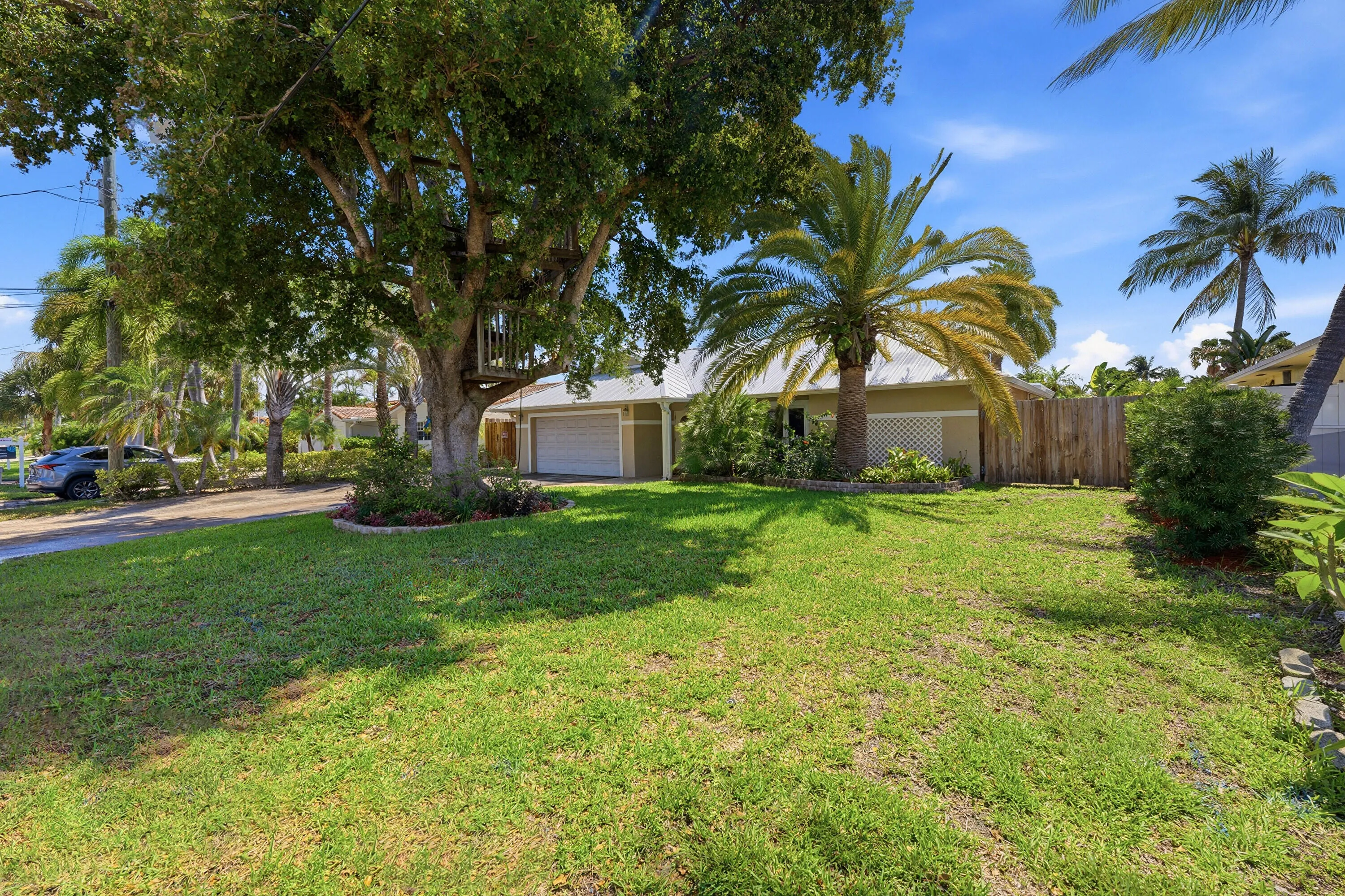 You will Love the Big Tree in the Front Yard, Big Yard & Wide Gate to the Back on the South Gate.