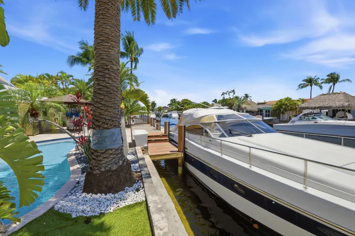 40' Dock, 70' Seawall, Freeform Pool with Rock Waterfall, Covered Patio Space for Fail Safe Outdoor Enteraining. Your Ocean Access, Waterfront Lifestyle at it's Finest!