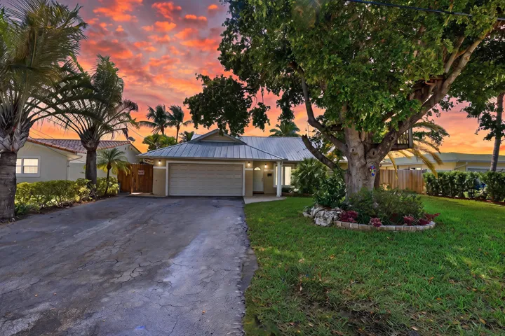 Welcome Home at Twilight! Aluminum Roof 2024, Impact Windows & Doors, HVAC 2020, 18" Travertine Flooring Inside 2025, Guest Bath 2025, Water Heater 2021, LED Lighting & More!