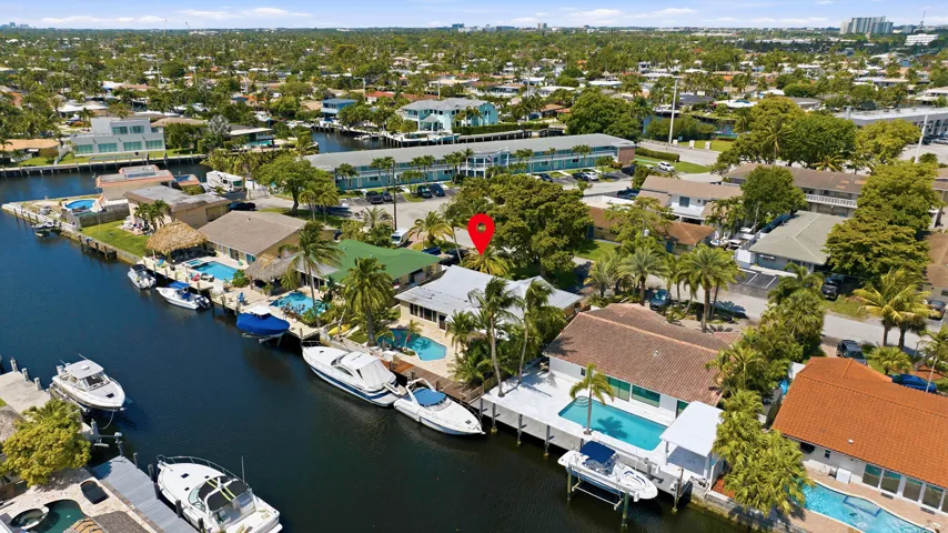Your Future Home is located on a CANAL WITH OCEAN ACCESS & on a Quiet Street. 42' DOCK, 70' SEAWALL RESURFACED (2026) & NEW ALUMINUM ROOF (2024). No through traffic on this canal. Welcome Home!