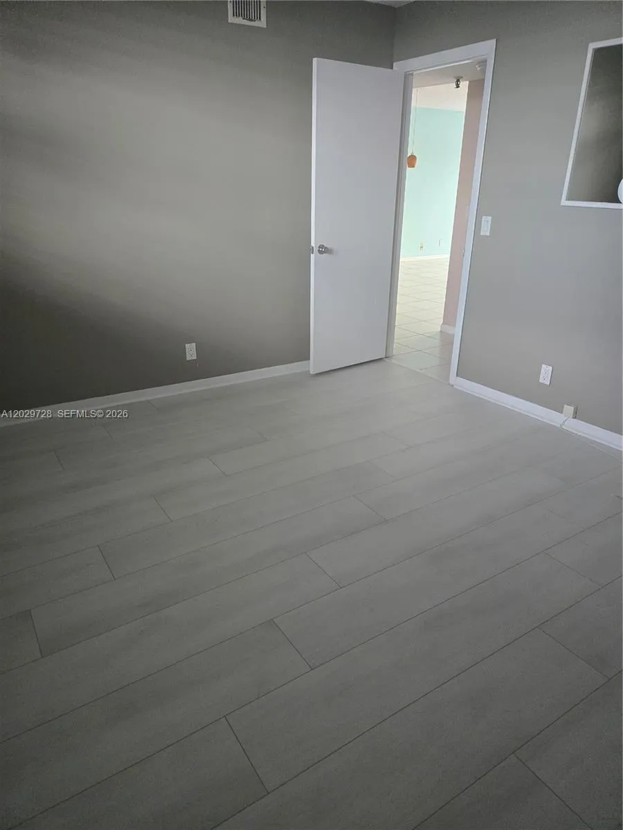 Guest Bedroom with new wood floors