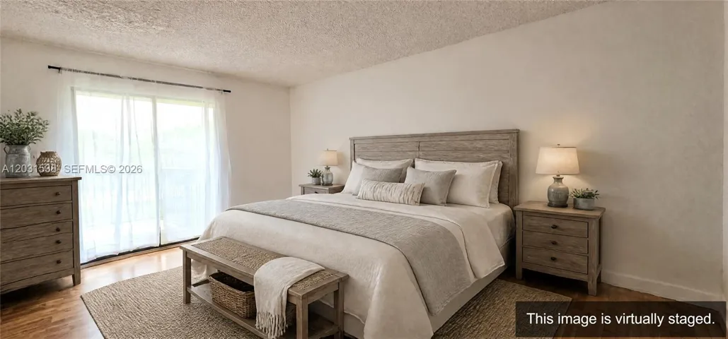 Master Bedroom overlooking balcony door.