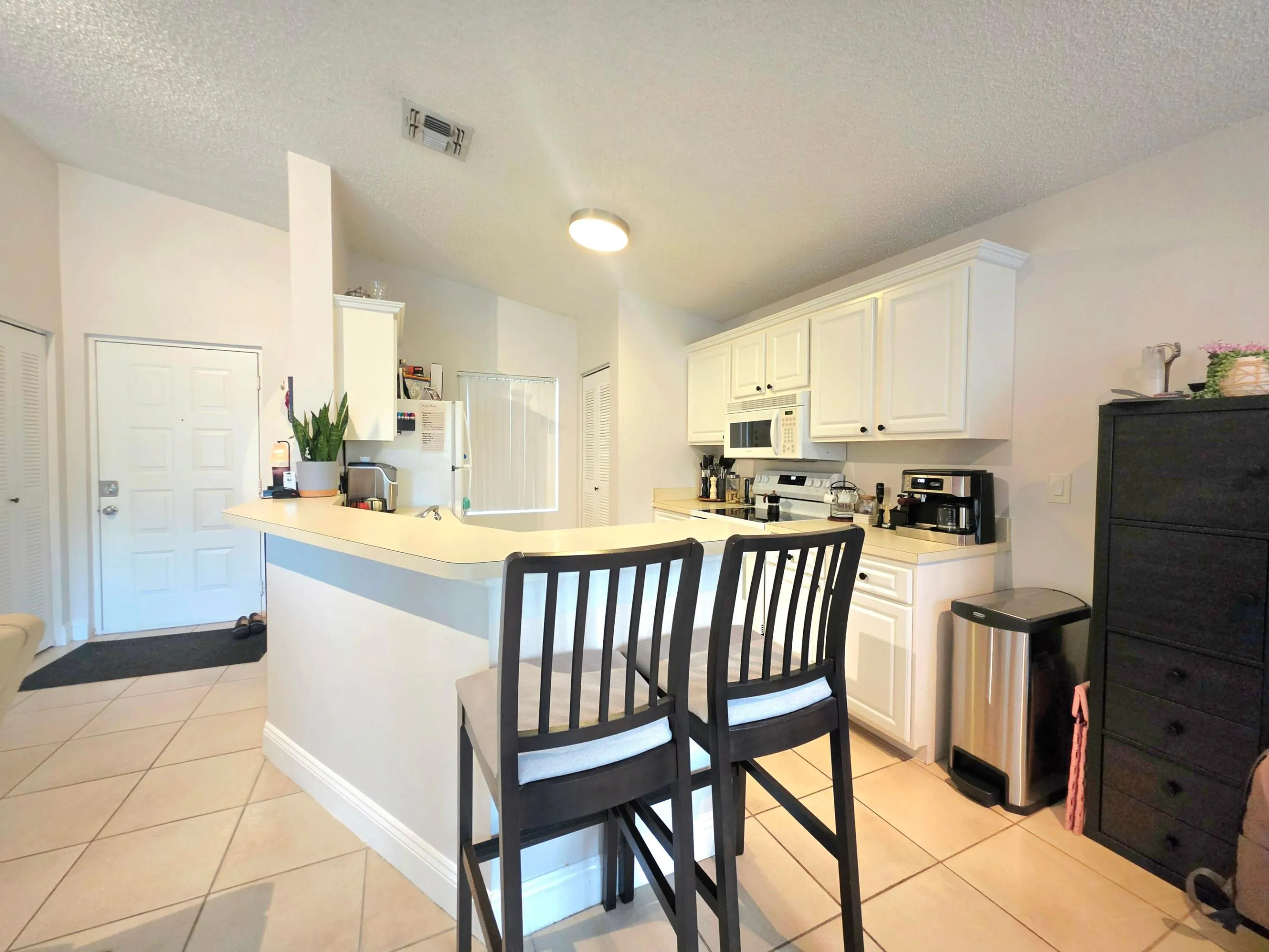KITCHEN HAS A NEW ELECTRIC RANGE/OVEN AND HAS A SNACK BAR, PERFECT FOR ENTERTAINING FAMILY AND FRIENDS