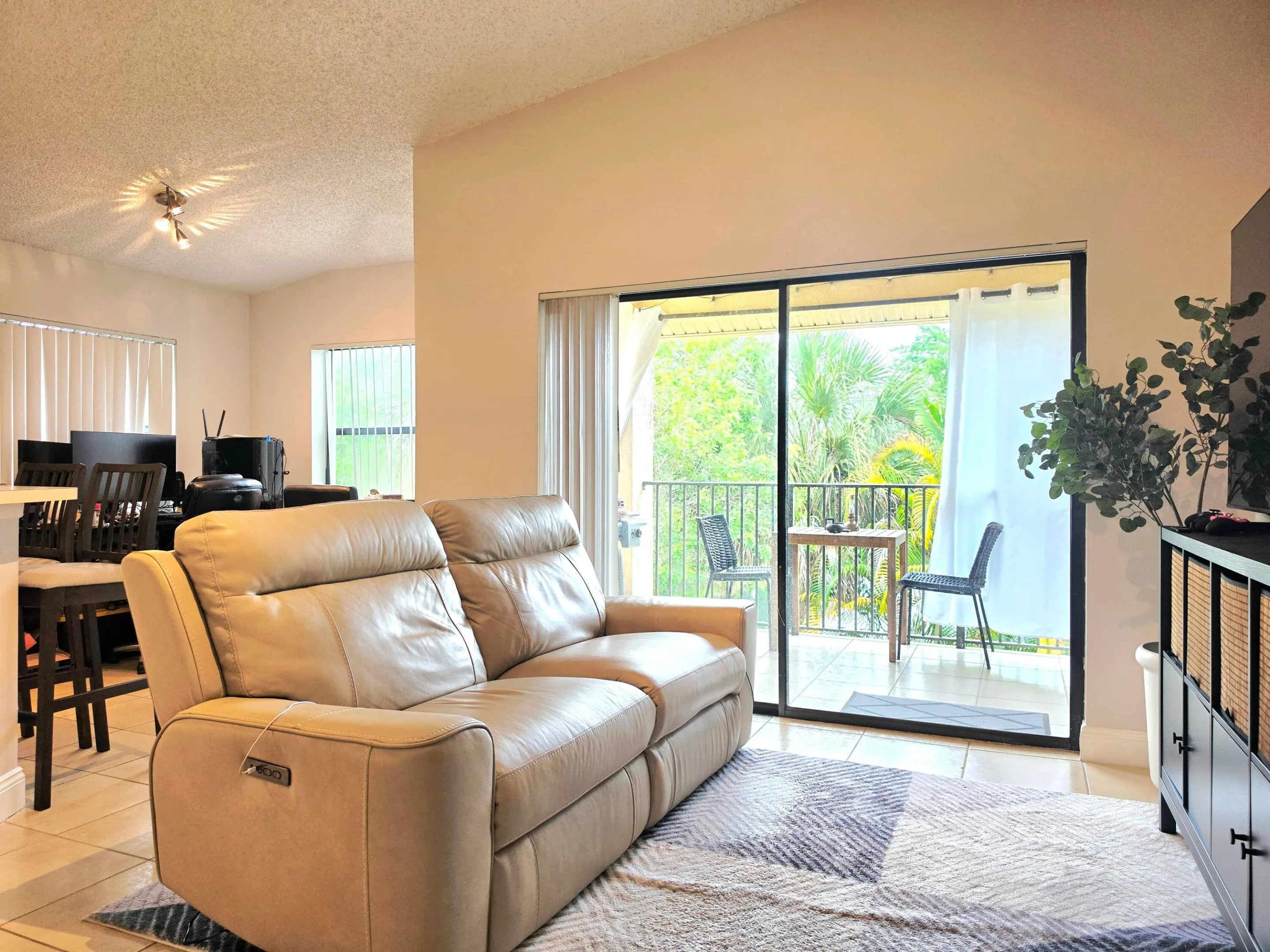 ANOTHER VIEW OF ONE OF TWO SLIDING DOORS TO ACCESS YOUR PRIVATE BALCONY