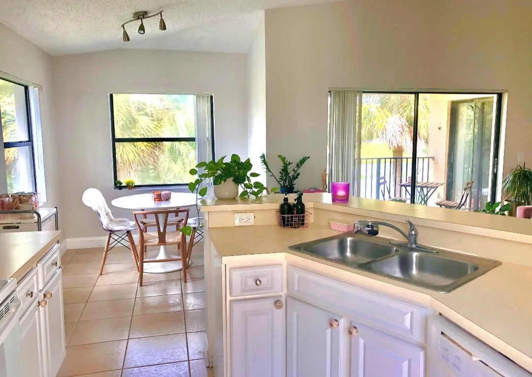 AMPLE AMOUNT OF NATURAL LIGHT TO ENJOY YOUR MORNING COFFEE IN YOUR DINING AREA OFF OF THE KITCHEN