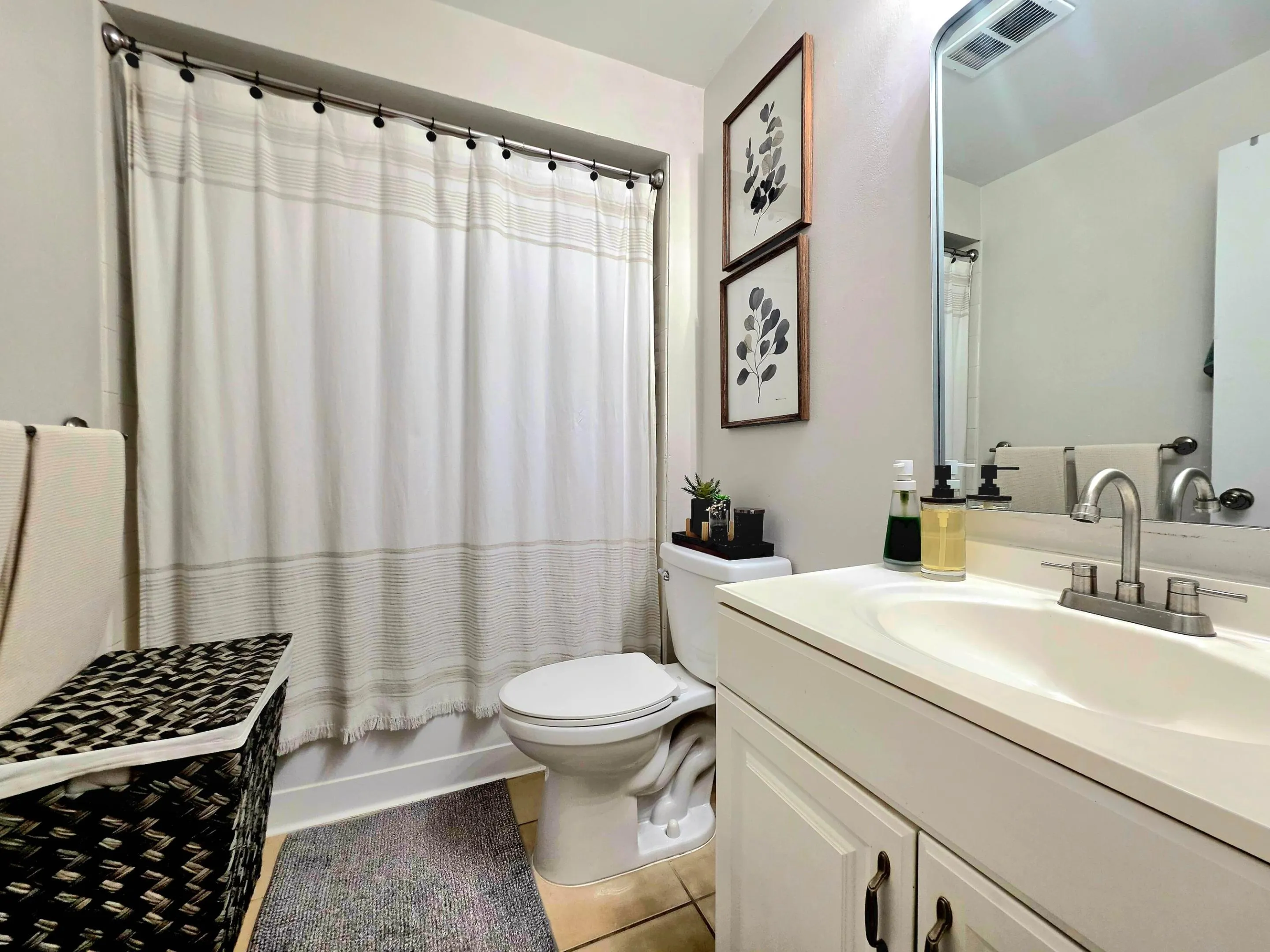 NEWER VANITY, MIRROR AND LIGHTING IN YOUR BATHROOM WITH SHOWER/TUB