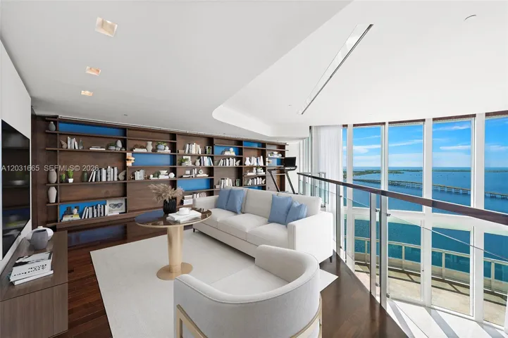 Family Room with custom wall unit on upper level