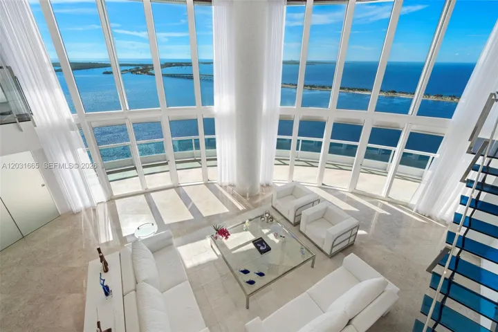 Highest 2 level townhouse Living Room water views from second floor mezzanine