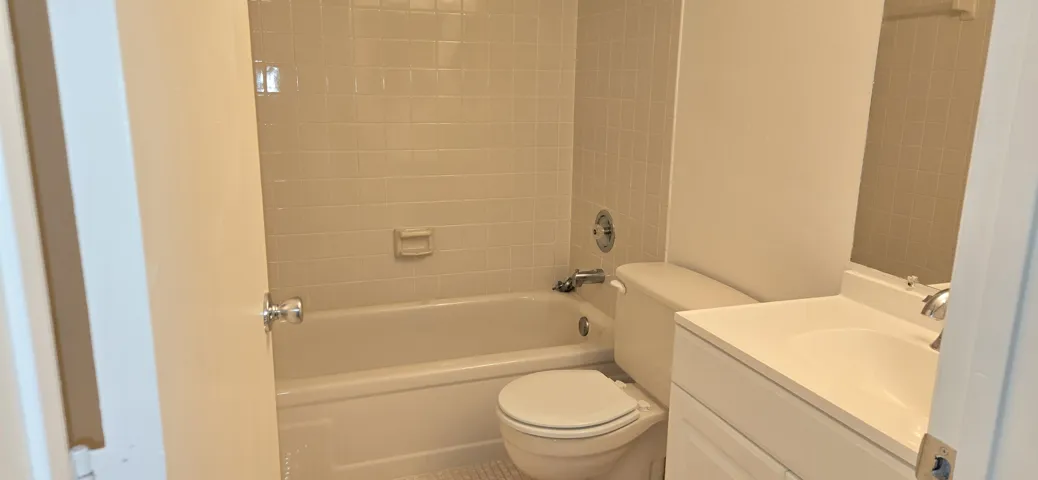 Guest bathroom has tub