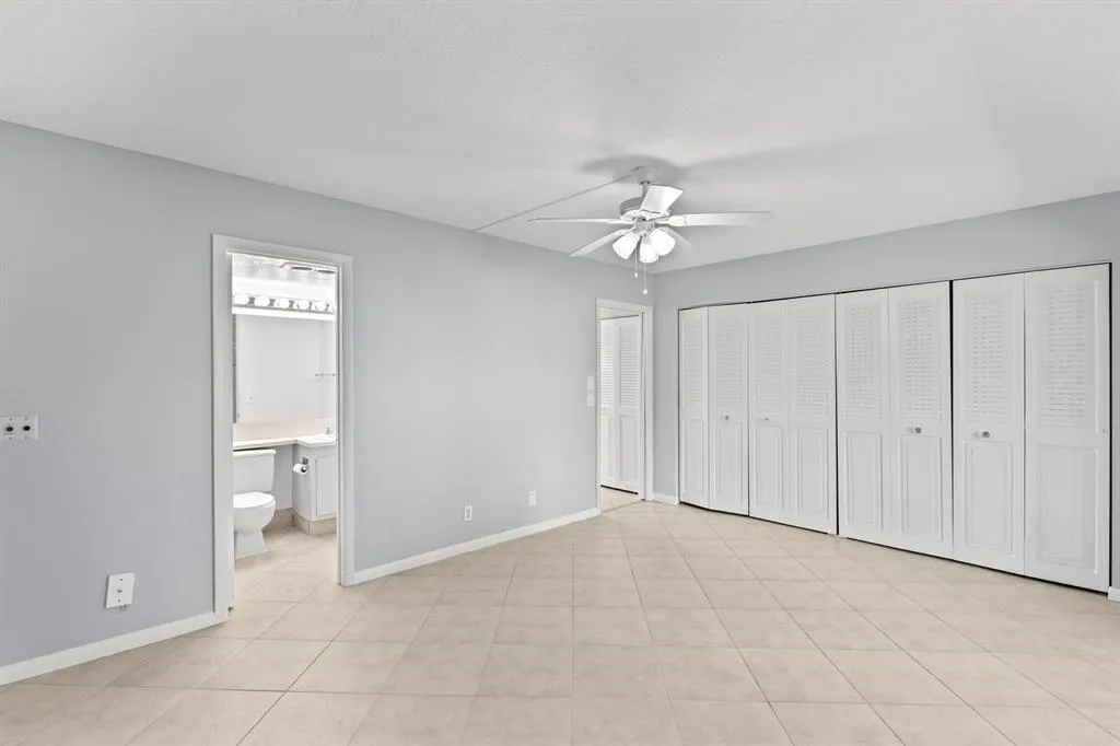 Bedroom with Wall of Closets