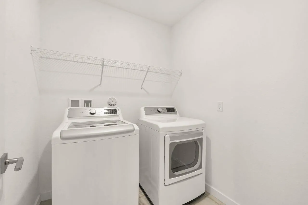 Full Washer and Dryer Utility room
