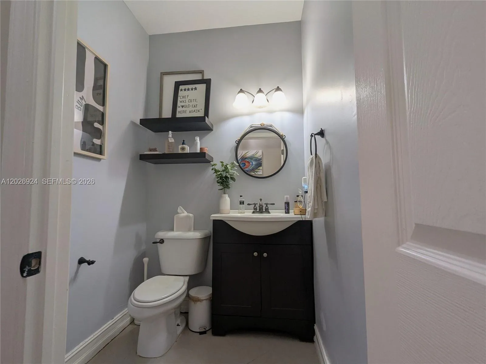 Elegant guest bathroom featuring refined décor, modern fixtures, and a thoughtfully designed layout that enhances both style and functionality.