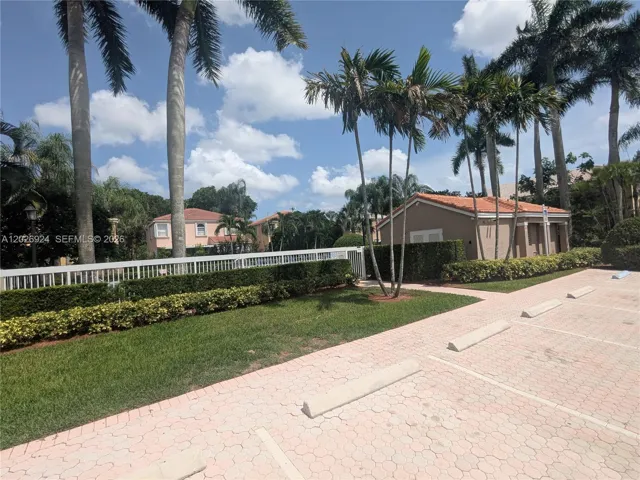 The clubhouse is conveniently located at the community entrance and offers ample parking for residents and guests