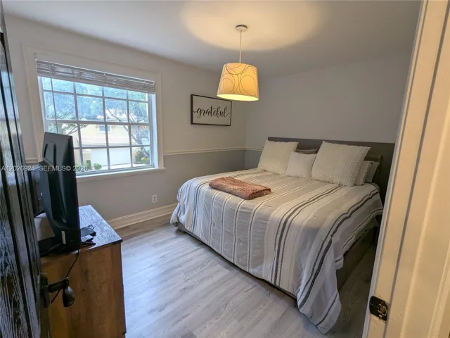 Second bedroom offering a bright and cozy layout with neutral finishes and a spacious walk-in closet, ideal for comfortable everyday​​‌​​​​‌​​‌‌​‌‌​​​‌‌​‌​‌​‌​​​‌​​ living.