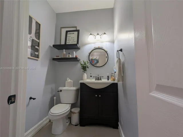 Elegant guest bathroom featuring refined décor, modern fixtures, and a thoughtfully designed layout that enhances both style and functionality.