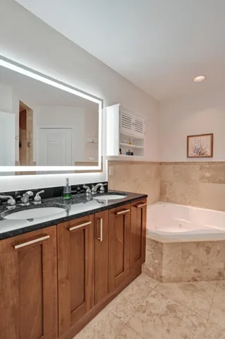 Primary Bath, dual sink vanity, separate tub and water closet