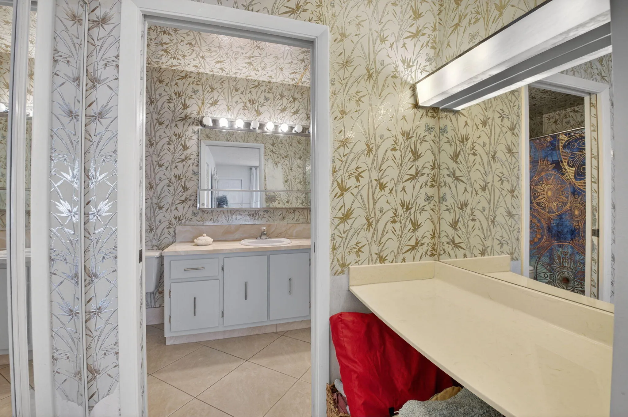 Large vanity space outside primary bathroom can be converted to a closet