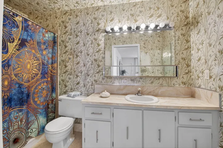Primary bathroom with tub/shower combo