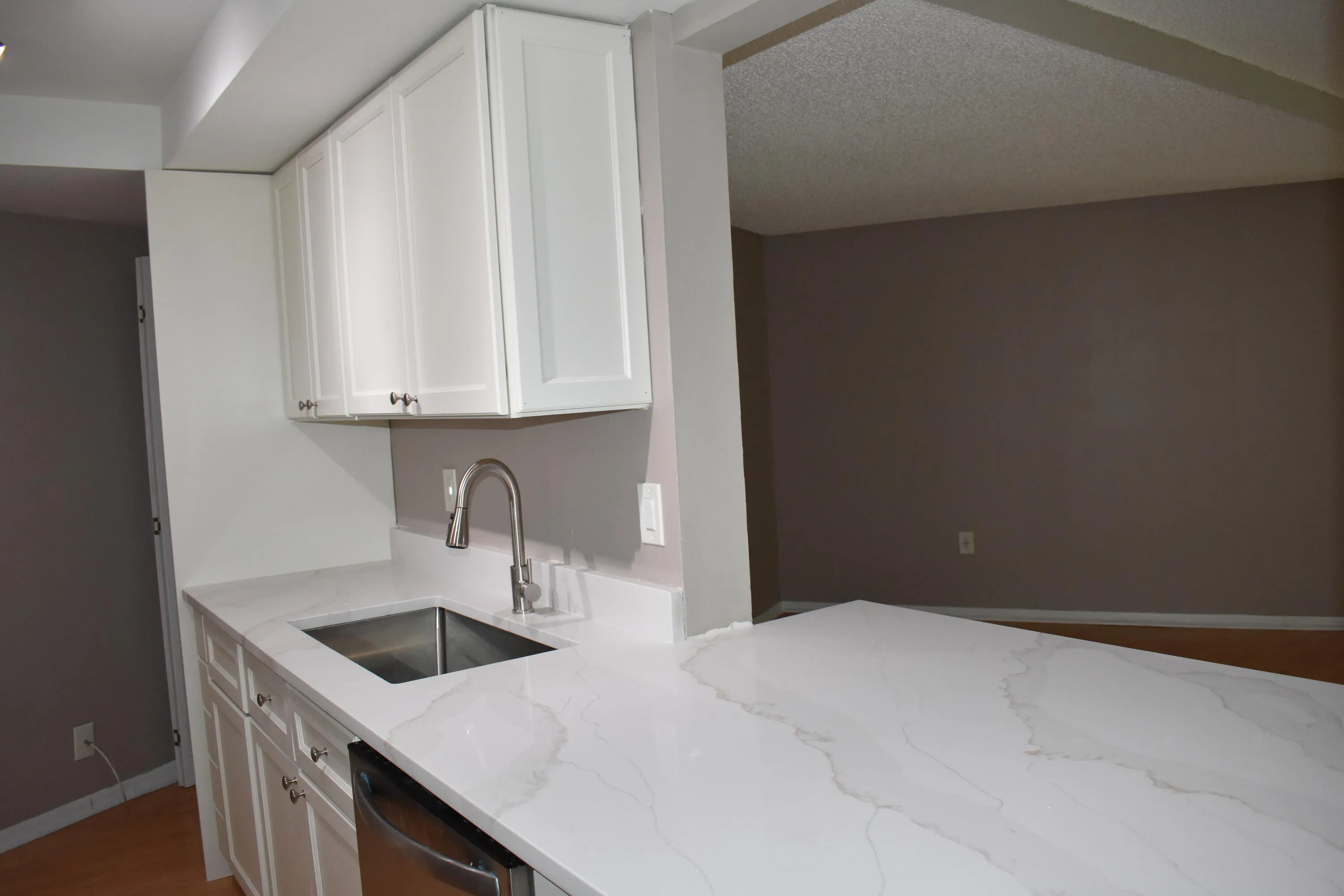 Kitchen with pass through to dining area