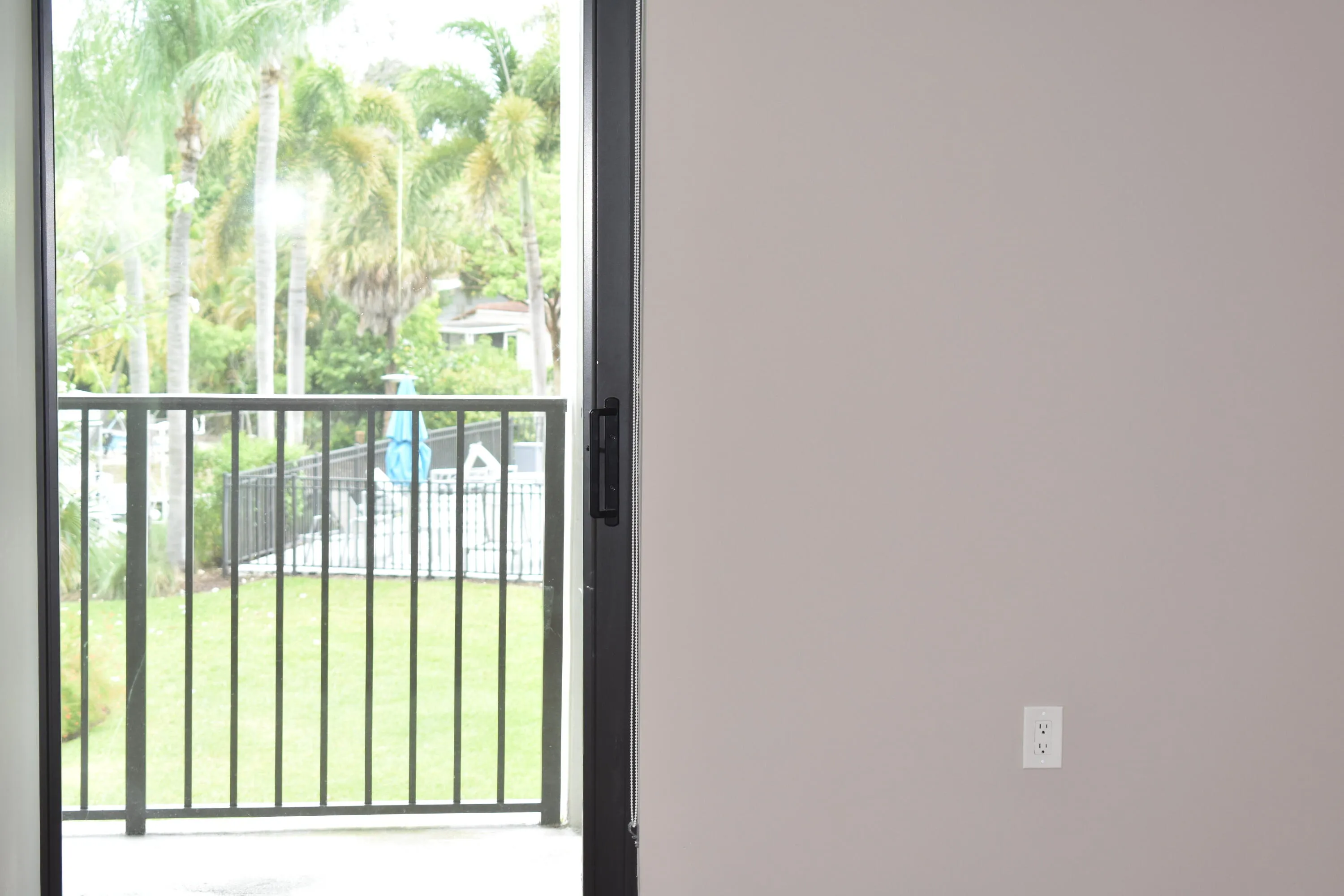 View from bedroom. New impact sliding glass doors