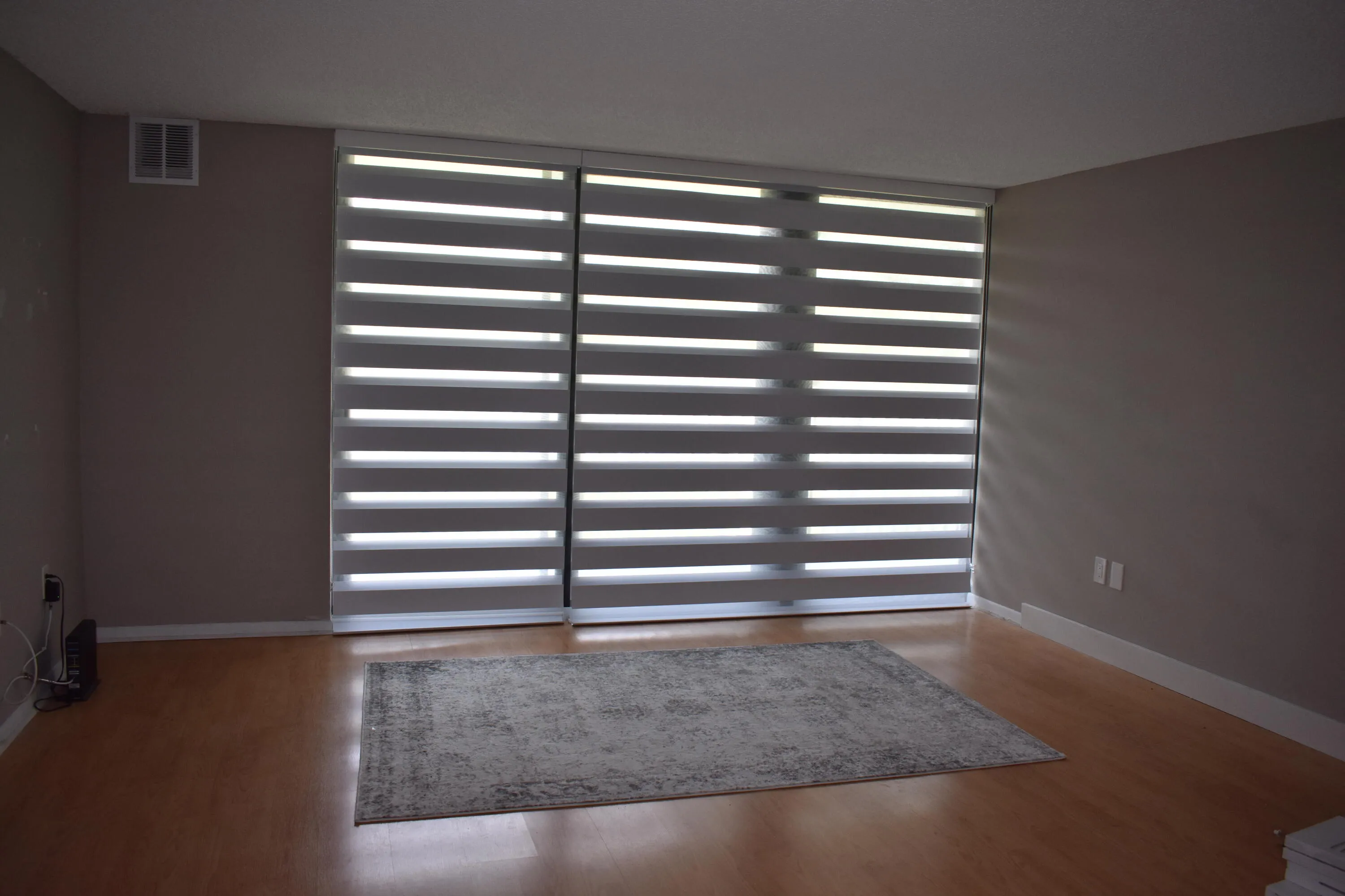 Sliding glass doors with shades down