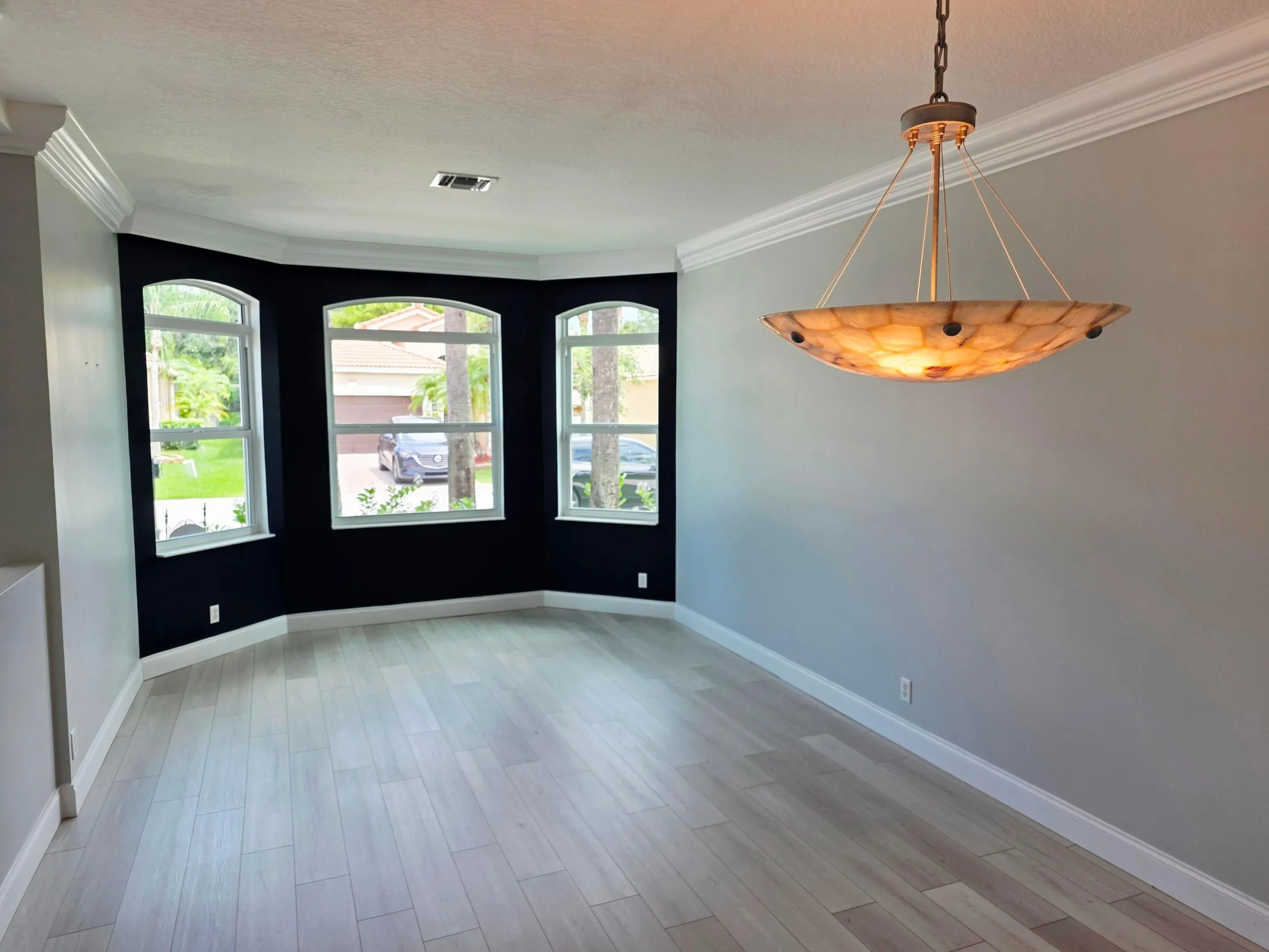 Dinning Room Living Room Picture Window Crown molding Everywhere