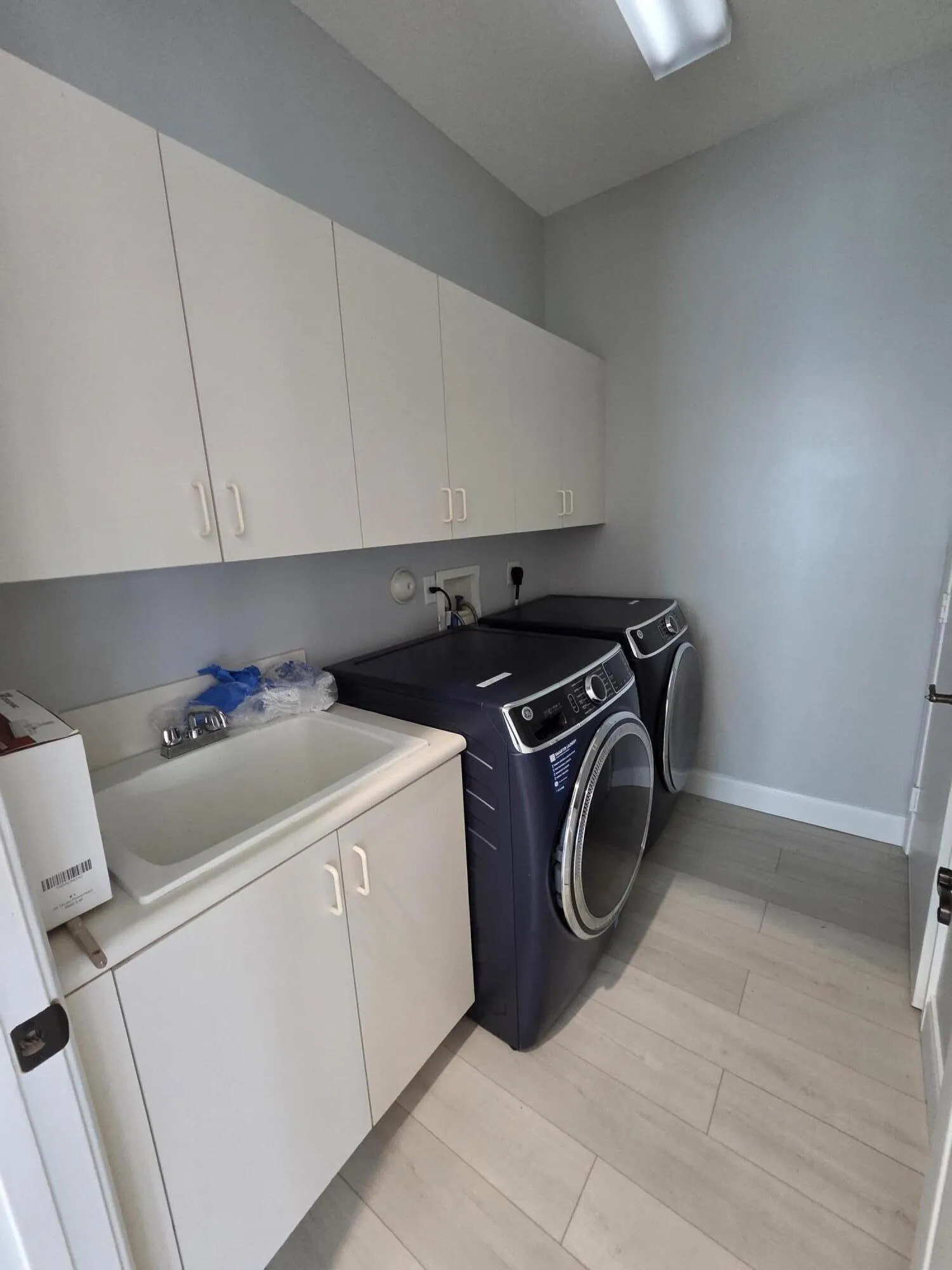 Laundry Room With sink and Cabinet