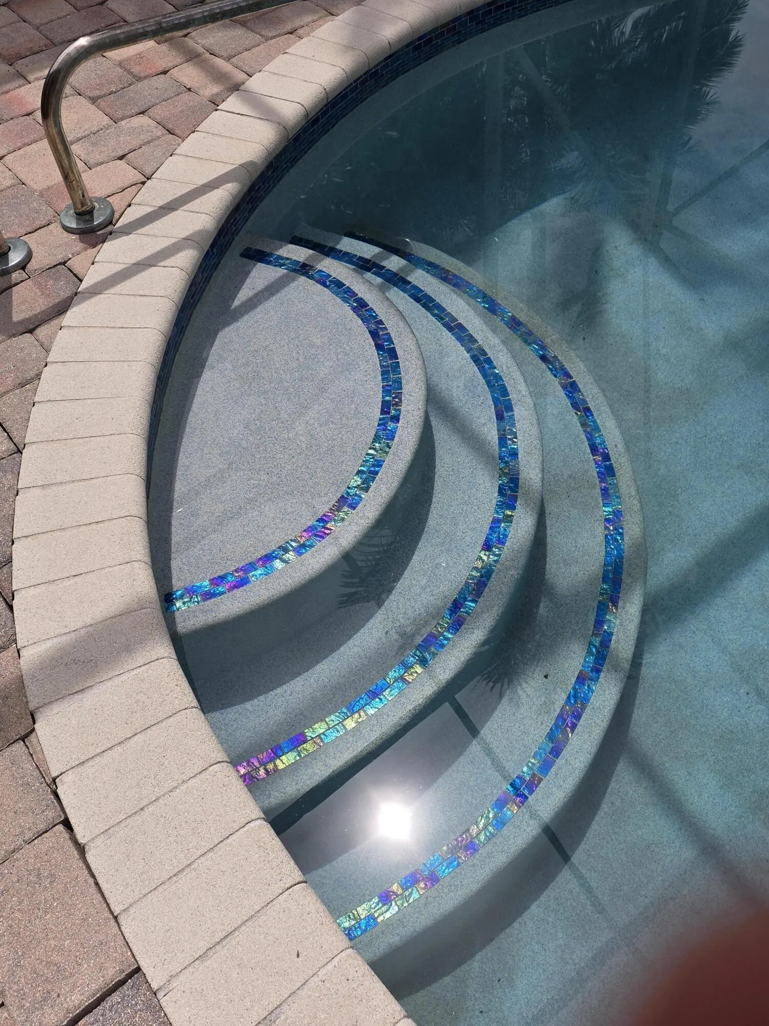 Newly done pool with Glass Tile Steps
