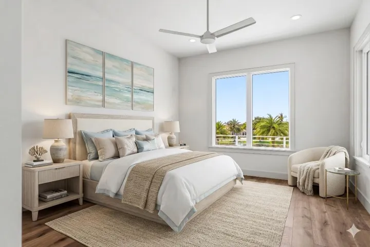 Virtually staged Warm wood floors and stunning west-facing windows define this bedroom, creating an inviting space that glows as the sun sets.