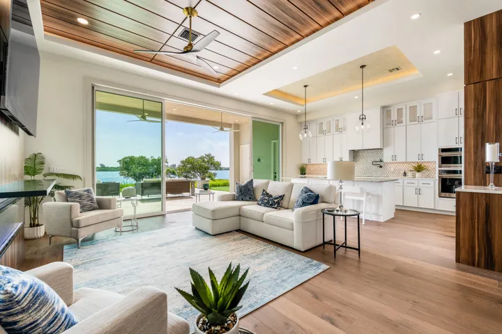 Living area has custom lighted tray ceilings.