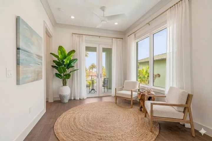 The second-floor lounge offers a tranquil retreat, perfectly curated as a cozy reading nook.