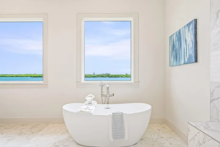 Savor peaceful river views from your spa tub—the ultimate way to unwind
