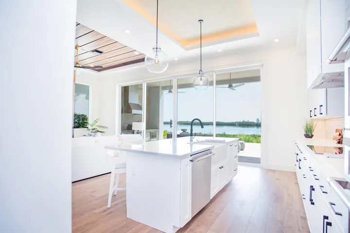 Kitchen has custom tray ceiling with beautiful Venetian plaster finish.