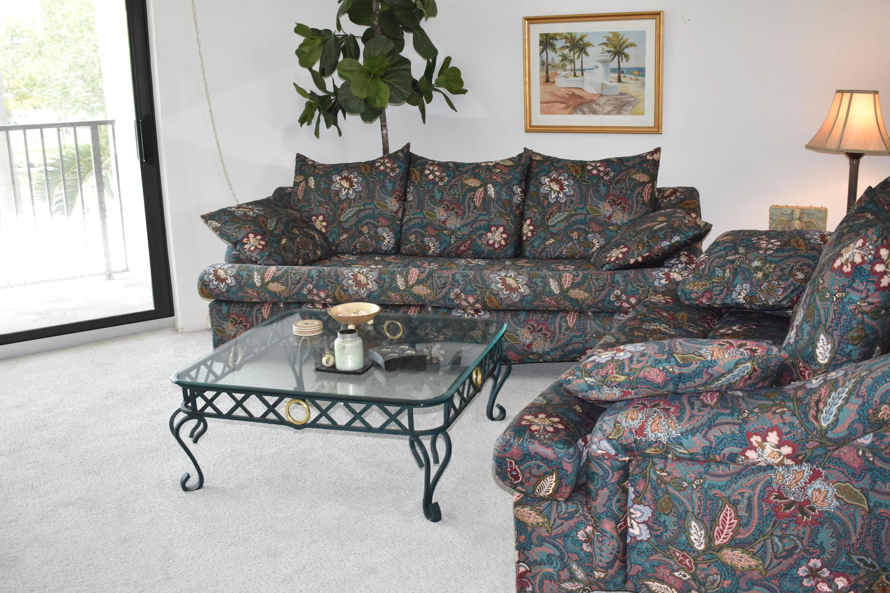 Living room with new impact sliding glass doors to balcony
