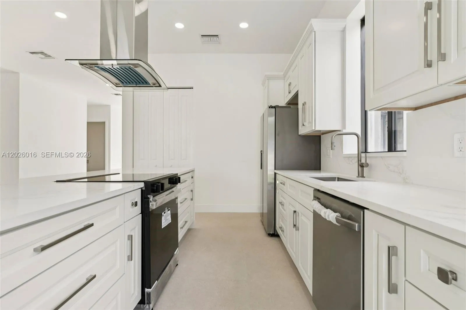 Photos shown are of a completed unit with the same layout and styling; the available unit is currently under construction and may vary.
