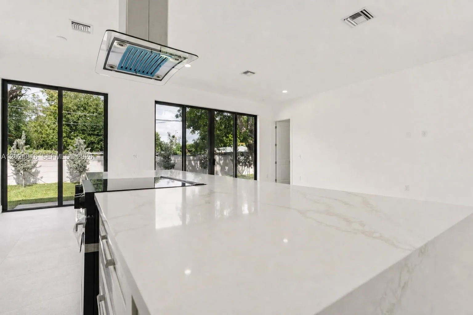 Photos shown are of a completed unit with the same layout and styling; the available unit is currently under construction and may vary.