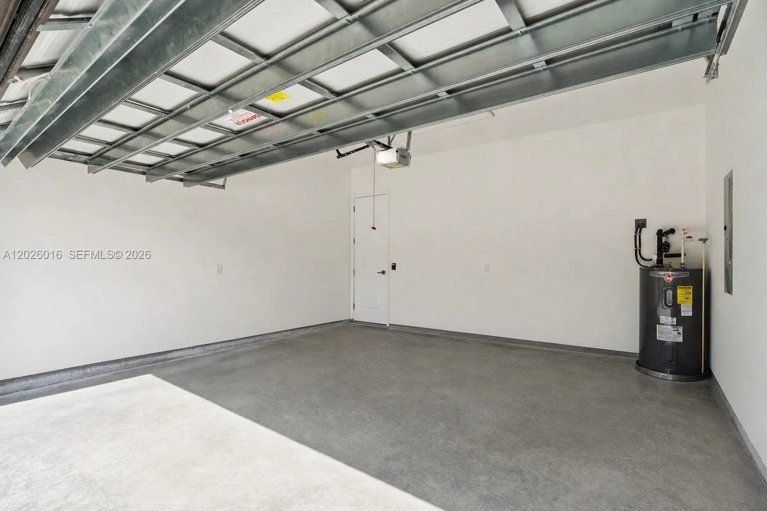 Photos shown are of a completed unit with the same layout and styling; the available unit is currently under construction and may vary.
