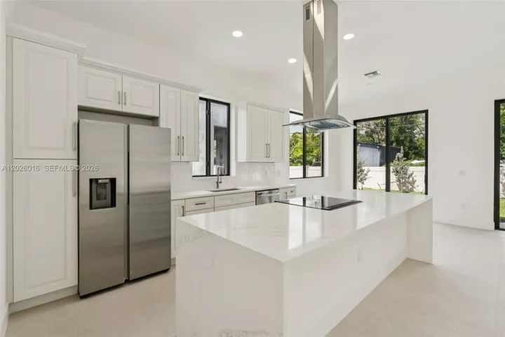 Photos shown are of a completed unit with the same layout and styling; the available unit is currently under construction and may vary.
