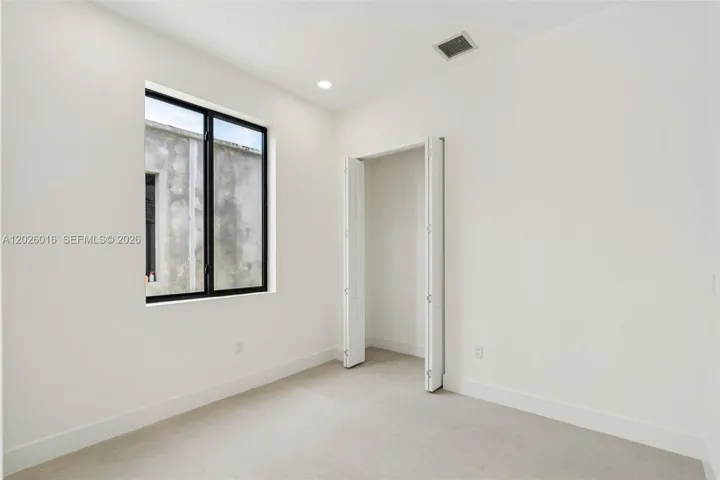 Photos shown are of a completed unit with the same layout and styling; the available unit is currently under construction and may vary.