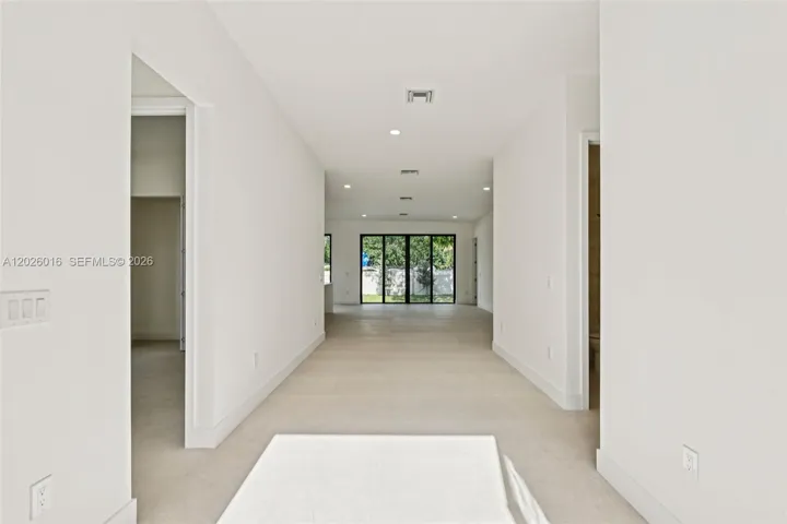 Photos shown are of a completed unit with the same layout and styling; the available unit is currently under construction and may vary.