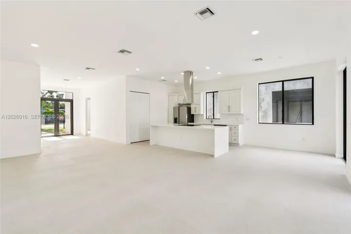 Photos shown are of a completed unit with the same layout and styling; the available unit is currently under construction and may vary.