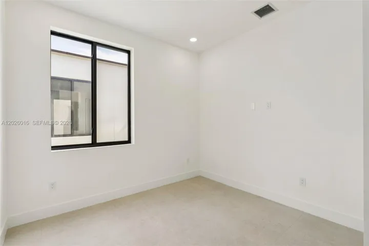 Photos shown are of a completed unit with the same layout and styling; the available unit is currently under construction and may vary.