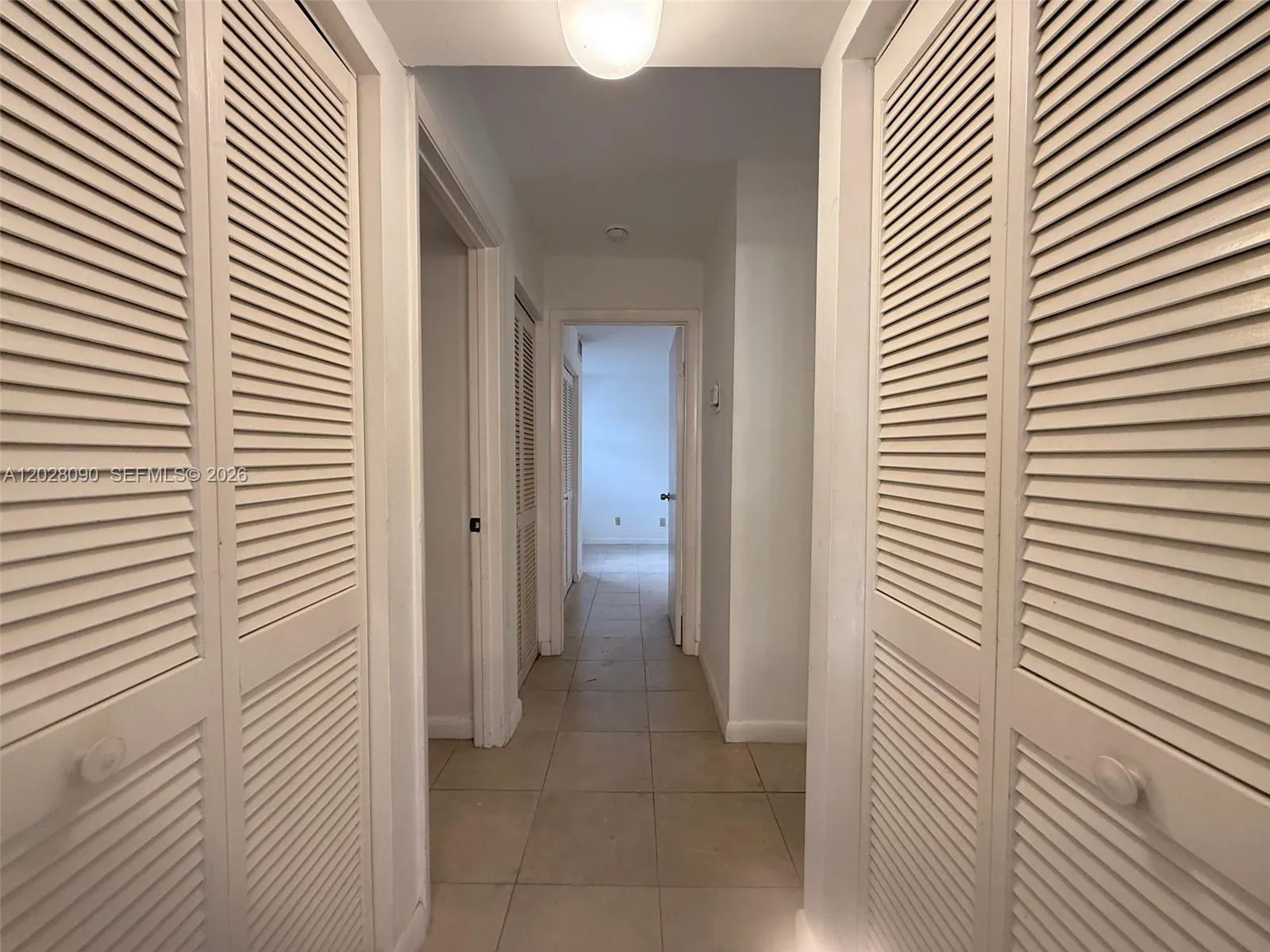 Hallway leading from bathroom 2 to secondary bedrooms