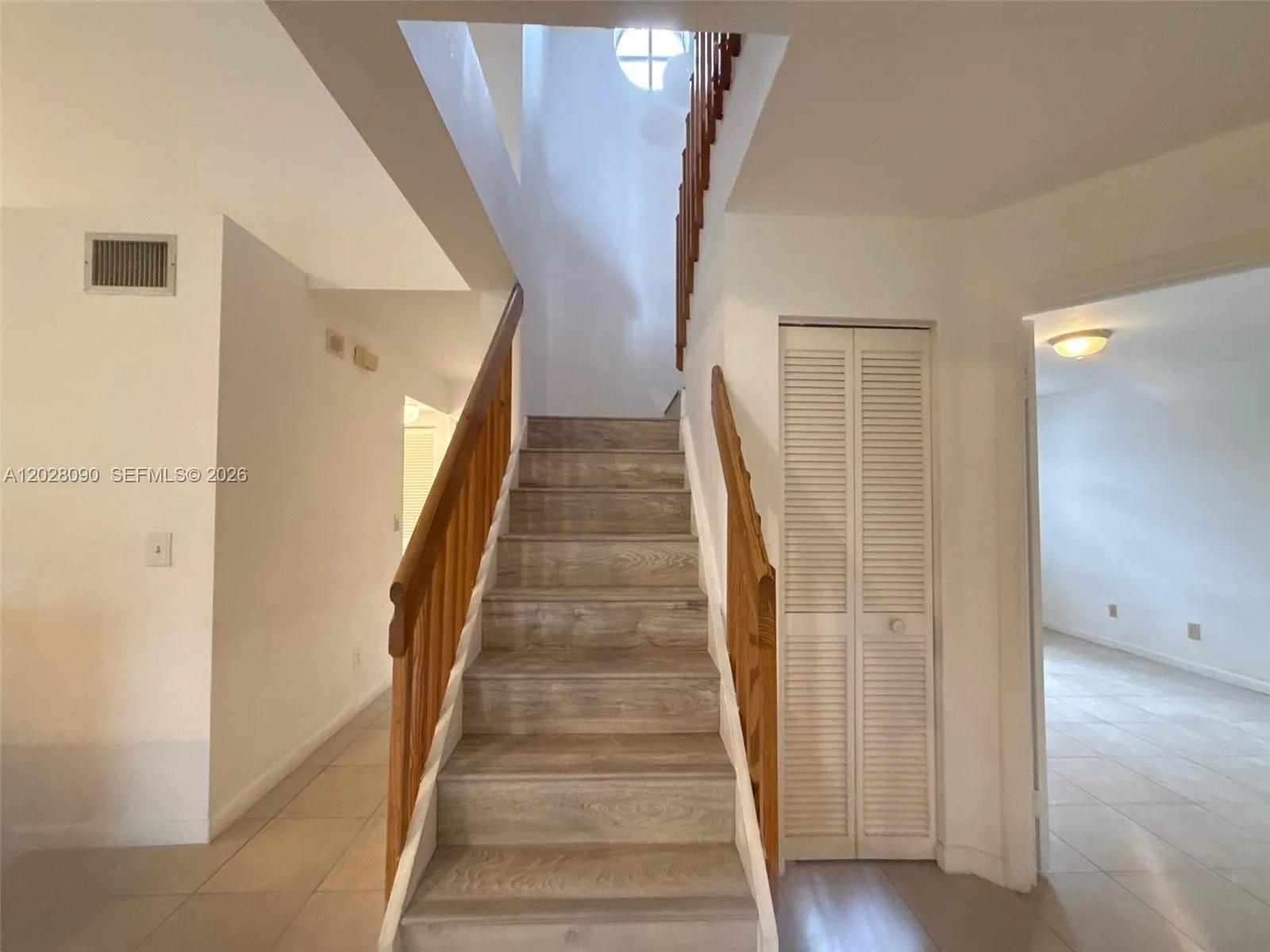 Staircase leading to the Primary Bedroom