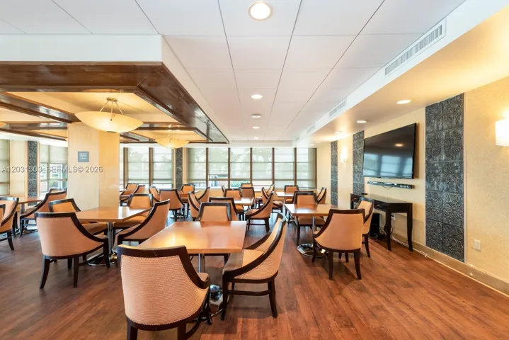 Social room with dining furniture.